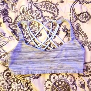 Grey and mint colored Lululemon sports bra